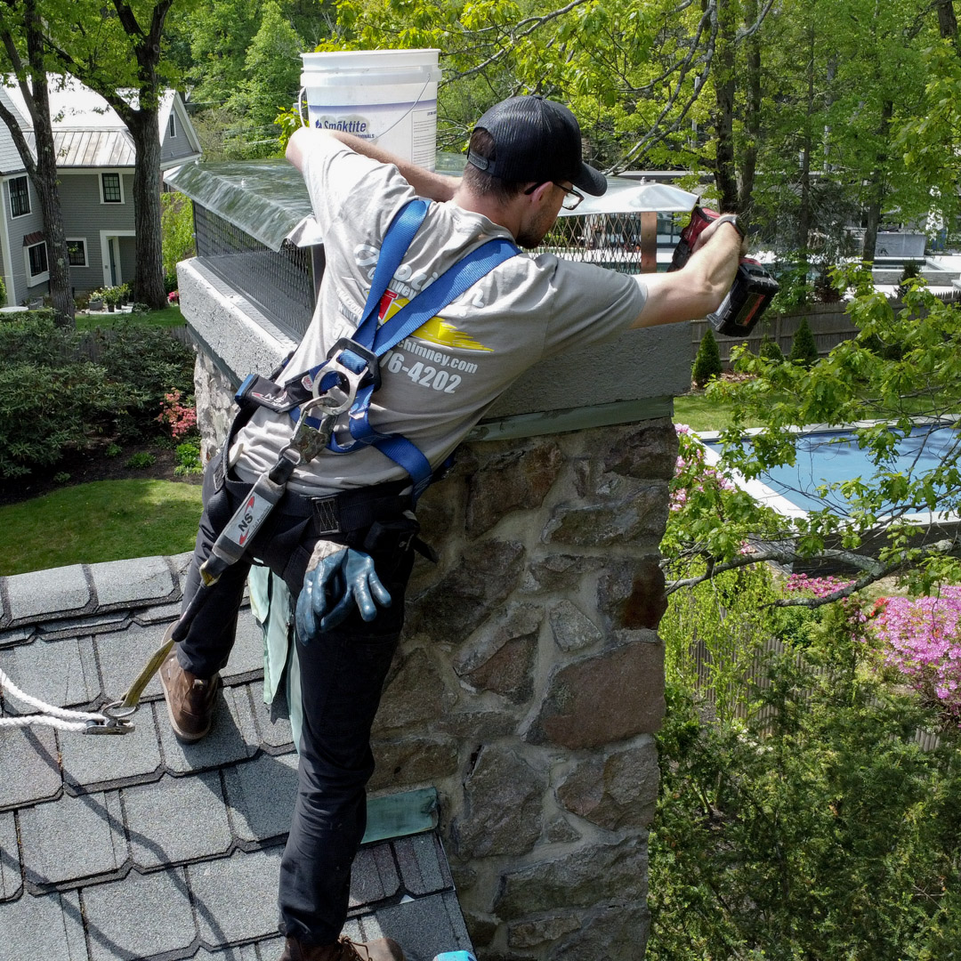 Installing new chimney caps and covers in Cumberland, RI & Newton, MA